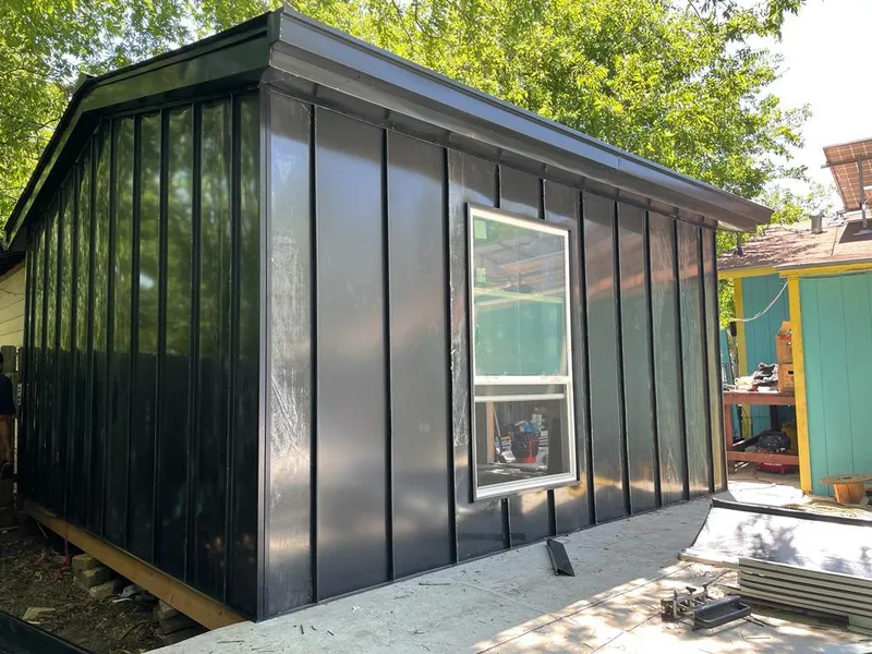 Black standing seam metal wall panels for Metal Roof Installation in Robbinsdale