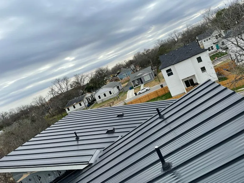 Standing seam metal roof panels with vents for Skylight Repair in Robbinsdale